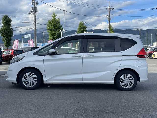 ホンダ フリード G ホンダセンシング 山梨県 2017(平29)年 10万km ホワイトオーキッドパール 純正メモリナビ(VXM-174VFi)/純正CD/DVD/Bluetooth接続/フルセグTV/バックカメラ/ETC/ドライブレコーダー/両側電動スライドドア/アダプティブクルーズコントロール/ステアリングスイッチ/取扱説明書/保証書