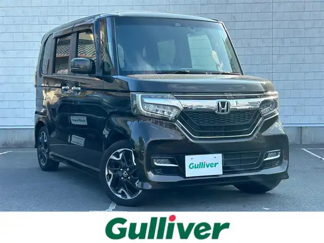 ホンダ Ｎ ＢＯＸ カスタム G L ターボ ホンダセンシング 静岡県 2018(平30)年 3.2万km プレミアムグラマラスブロンズP 純正8インチナビ/　（フルセグTV/Bluetooth/DVD/CD）/ホンダセンシング/衝突軽減ブレーキ/レーダークルーズコントロール/横滑り防止装置/バックカメラ/両側パワースライドドア/ハーフレザー/ビルトインETC/前方ナビ連動ドライブレコーダー/プッシュスタート/スマートキー/オートマチックハイビーム/オートライト/LEDヘッドライト/純正フロアマット/純正15インチアルミホイール/保証書/取扱説明書