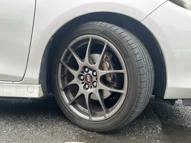 トヨタ ヴィッツ GRMNターボ 宮崎県 2013(平25)年 6.9万km スーパーホワイトⅡ 社外ナビ　AVIC-ZH0007/（DTV/CD/DVD/BT)/バックカメラ/ETC/プッシュスタート/電格ウィンカーミラー/オートライト/ヘッドライトレベライザー/純正フロアマット/純正アルミホイール/純正エアロ（サイド/リアスポイラー）/革巻きステアリング/横滑り防止装置