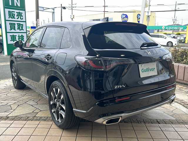 ホンダ ＺＲ－Ｖ ハイブリッド e:HEV Z 静岡県 2023(令5)年 1.4万km クリスタルブラックパール 純正メモリナビ/・フルセグＴＶ/・Bluetooth/・USB/・AppleCarPlay/・AM/・FM/主要装備/・ホンダセンシング/・衝突軽減/・レーンキープ/・追従クルコン/・BSM/・全方位カメラ/・コーナーセンサー前後/・BOSEプレミアムサウンド/・ワイヤレス充電/・パワーバックドア/・レザーシート/・シートヒーターD/N席/・パワーシートD/N席/・ハンドルヒーター/・ビルトインETC2.0/・純正フロアマット/・LEDオートライト/・オートハイビーム