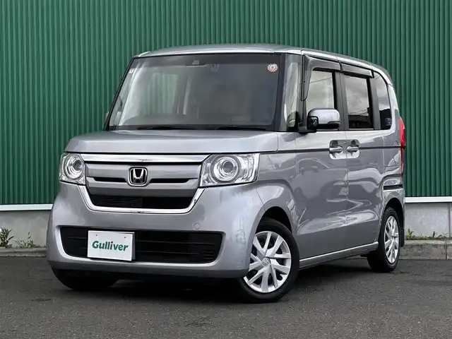 ホンダ Ｎ ＢＯＸ G L ターボ ホンダセンシング 宮城県 2018(平30)年 2.7万km ルナシルバーM ホンダセンシング/●衝突軽減ブレーキ（CMBS）/●誤発進抑制機能/●歩行者事故低減ステアリング/●路外逸脱抑制機能/●渋滞追従機能付アダプティブクルーズコントロール（ACC）/●車線維持支援システム（LKAS）/●先行車発進お知らせ機能/●標識認識機能/●後方誤発進抑制機能/●オートハイビーム/純8型ナビ（VXU-185VFi）/【CD・DVD・SD・BT・フルセグTV】/バックカメラ/純正ドライブレコーダー/両側パワースライドドア/パドルシフト/リアサンシェード/ステアリングスイッチ/リアコーナーセンサー/LEDヘッドランプ/オートライト/スマートキー＆プッシュスタート/電動格納ミラー/フロアマット/ドアバイザー/スマートキーX２/ETC