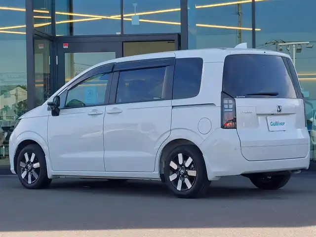 ホンダ フリード AIR EX 東京都 2024(令6)年 1.3万km プラチナホワイトパール Honda SENSING/・衝突軽減ブレーキ/・誤発進抑制機能/・歩行者事故低減ステアリング/・路外逸脱抑制機能/・アダプティブクルーズコントロール/・車線維持支援システム/・先行車発進お知らせ機能/・標識認識機能/・ブラインドスポットインフォメーション/プッシュスタート/純正9インチナビ/フルセグTV/バックカメラ/ビルトインETC/前後ドライブレコーダー/両側パワースライドドア/ハーフレザーシート/シートヒーター/後席ロールサンシェード/LEDヘッドライト/スマートキー/純正15インチアルミホイール