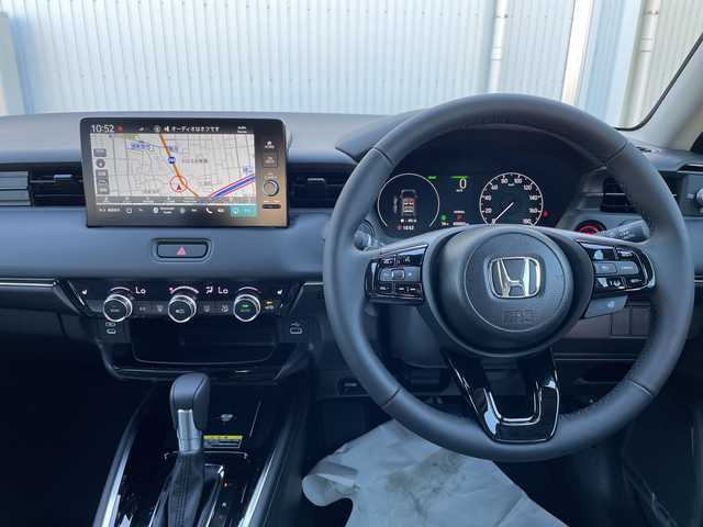 ホンダ ヴェゼル ハイブリッド e:HEV Z 石川県 2025(令7)年 0.1千km 黒 登録済未使用車　純正９型ナビ　フルセグＴＶ　バックカメラ　ＬＥＤヘッドライト　ＥＴＣ２．０　純正アルミ　パワーバックドア　ホンダセンシング　シートヒーター　レーダークルーズ　ワイヤレス充電　保証書