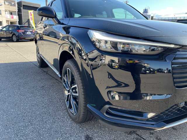 ホンダ ヴェゼル ハイブリッド e:HEV Z 石川県 2025(令7)年 0.1千km 黒 登録済未使用車　純正９型ナビ　フルセグＴＶ　バックカメラ　ＬＥＤヘッドライト　ＥＴＣ２．０　純正アルミ　パワーバックドア　ホンダセンシング　シートヒーター　レーダークルーズ　ワイヤレス充電　保証書