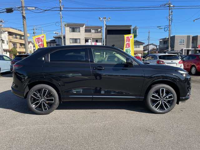 ホンダ ヴェゼル ハイブリッド e:HEV Z 石川県 2025(令7)年 0.1千km 黒 登録済未使用車　純正９型ナビ　フルセグＴＶ　バックカメラ　ＬＥＤヘッドライト　ＥＴＣ２．０　純正アルミ　パワーバックドア　ホンダセンシング　シートヒーター　レーダークルーズ　ワイヤレス充電　保証書