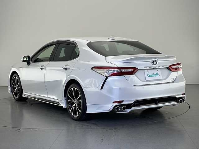 トヨタ カムリ WSレザーパッケージ 長野県 2019(平31)年 6万km プラチナホワイトパールマイカ TRDフルエアロ&マフラー/純正SDナビ&フルセグTV&CD&DVD&USB&BT/トヨタセーフティセンス/アダプティブクルーズコントロール/レーンディパーチャーアラート/プリクラッシュセーフティ/ブラインドスポットモニター/リアクロストラフィックアラート/クリアランスソナー/ヘッドアップディスプレイ/オートマチックハイビーム/先行車発進告知/純正前後ドライブレコーダー/寒冷地仕様/合皮シート/前席パワーシート/前席シートヒーター/ステアリングスイッチ/バックカメラ/ビルトインETC/LEDヘッドライト/フロントフォグランプ/オートライト/電動格納ミラー/ウィンカーミラー/純正18インチAW装着/純正フロアマット/プッシュスタート/スマートキー