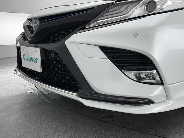 トヨタ カムリ WSレザーパッケージ 長野県 2019(平31)年 6万km プラチナホワイトパールマイカ TRDフルエアロ&マフラー/純正SDナビ&フルセグTV&CD&DVD&USB&BT/トヨタセーフティセンス/アダプティブクルーズコントロール/レーンディパーチャーアラート/プリクラッシュセーフティ/ブラインドスポットモニター/リアクロストラフィックアラート/クリアランスソナー/ヘッドアップディスプレイ/オートマチックハイビーム/先行車発進告知/純正前後ドライブレコーダー/寒冷地仕様/合皮シート/前席パワーシート/前席シートヒーター/ステアリングスイッチ/バックカメラ/ビルトインETC/LEDヘッドライト/フロントフォグランプ/オートライト/電動格納ミラー/ウィンカーミラー/純正18インチAW装着/純正フロアマット/プッシュスタート/スマートキー