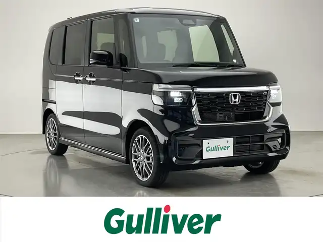 ホンダ Ｎ ＢＯＸ カスタム ターボ 愛知県 2024(令6)年 0.4万km クリスタルブラックパール 純正９型ナビ　シートヒーター　両側パワスラ　バックカメラ　フルセグＴＶ　追従クルコン　ＥＴＣ　ホンダセンシング　パドルシフト　黒ハーフレザー　コーナーセンサー　衝突軽減　ＬＥＤライト　ＵＳＢ接続　禁煙　オートハイビーム　車線逸脱　純正フロアマット　純正１５インチAW　プッシュスタート　スマートキー