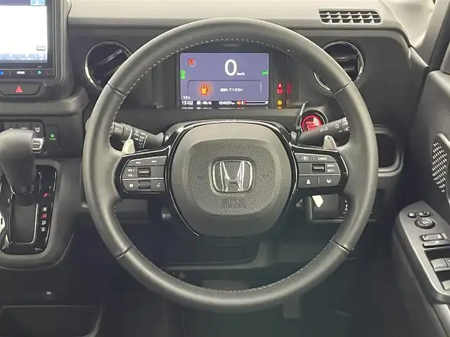 ホンダ Ｎ ＢＯＸ カスタム ターボ 愛知県 2024(令6)年 0.4万km クリスタルブラックパール 純正９型ナビ　シートヒーター　両側パワスラ　バックカメラ　フルセグＴＶ　追従クルコン　ＥＴＣ　ホンダセンシング　パドルシフト　黒ハーフレザー　コーナーセンサー　衝突軽減　ＬＥＤライト　ＵＳＢ接続　禁煙　オートハイビーム　車線逸脱　純正フロアマット　純正１５インチAW　プッシュスタート　スマートキー