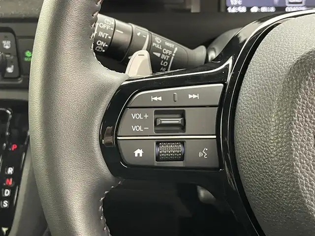 ホンダ Ｎ ＢＯＸ カスタム ターボ 愛知県 2024(令6)年 0.4万km クリスタルブラックパール 純正９型ナビ　シートヒーター　両側パワスラ　バックカメラ　フルセグＴＶ　追従クルコン　ＥＴＣ　ホンダセンシング　パドルシフト　黒ハーフレザー　コーナーセンサー　衝突軽減　ＬＥＤライト　ＵＳＢ接続　禁煙　オートハイビーム　車線逸脱　純正フロアマット　純正１５インチAW　プッシュスタート　スマートキー