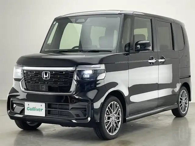 ホンダ Ｎ ＢＯＸ カスタム ターボ 愛知県 2024(令6)年 0.4万km クリスタルブラックパール 純正９型ナビ　シートヒーター　両側パワスラ　バックカメラ　フルセグＴＶ　追従クルコン　ＥＴＣ　ホンダセンシング　パドルシフト　黒ハーフレザー　コーナーセンサー　衝突軽減　ＬＥＤライト　ＵＳＢ接続　禁煙　オートハイビーム　車線逸脱　純正フロアマット　純正１５インチAW　プッシュスタート　スマートキー