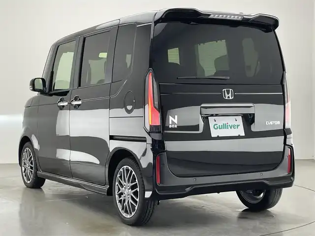 ホンダ Ｎ ＢＯＸ カスタム ターボ 愛知県 2024(令6)年 0.4万km クリスタルブラックパール 純正９型ナビ　シートヒーター　両側パワスラ　バックカメラ　フルセグＴＶ　追従クルコン　ＥＴＣ　ホンダセンシング　パドルシフト　黒ハーフレザー　コーナーセンサー　衝突軽減　ＬＥＤライト　ＵＳＢ接続　禁煙　オートハイビーム　車線逸脱　純正フロアマット　純正１５インチAW　プッシュスタート　スマートキー