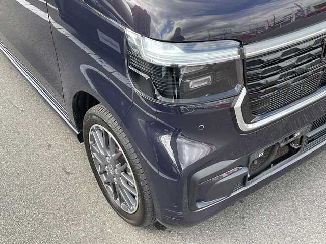 ホンダ Ｎ ＢＯＸ カスタム ターボ 長野県 2023(令5)年 1.5万km トワイライトミストブラックパール 禁煙車/4WD/純正ナビ//Bluetooth/CD/DVD/フルセグTV/USB入力端子(タイプCあり)/両側パワースライドドア/ハーフレザーシート/前席シートヒーター/ETC/純正AW15インチ/ホンダセンシング/・衝突軽減ブレーキ/・先行者発進お知らせ機能/・路外逸脱抑制機能/・レーダークルーズコントロール/アイドリングストップ/電動パーキングブレーキ/ブレーキホールド/パドルシフト/LEDヘッドライト/オートマチックハイビーム/プッシュスタート/スマートキー