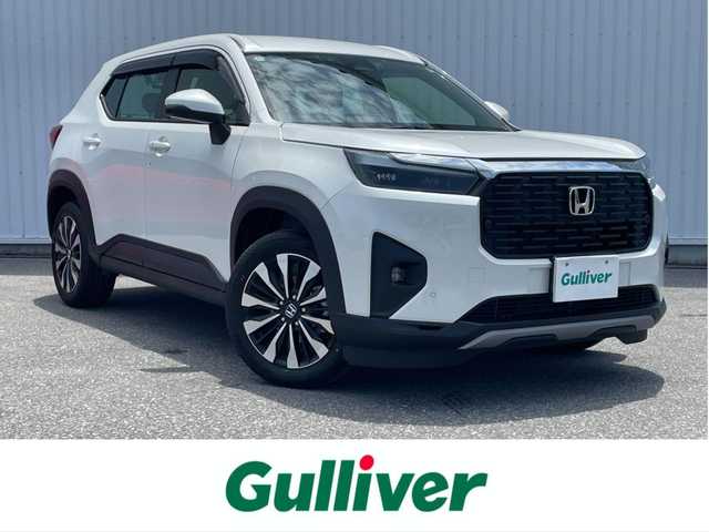 ホンダ ＷＲ－Ｖ Z 滋賀県 2024(令6)年 0.3万km ブリリアントスポーティブルーメタリック2トーン ワンオーナー/9型ディスプレイオーディオ/・Bluetooth/フルセグ/バックカメラ/革巻きステアリング/ステアリングリモコン/パドルシフト/ETC/前後ドライブレコーダー/LEDヘッドライト/オートリトラミラー/シートリフター/ホンダセンシング/・車線維持支援システム（LKAS)/・アダプティブクルーズコントロール/・オートハイビーム/・衝突軽減ブレーキ（CMBS）/・踏み間違い衝突軽減システム/・路外逸脱抑制機能/・歩行者事故低減ステアリング/・先行車発進お知らせ機能/・標識認識機能/・パーキングセンサーシステム/スマートキー