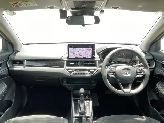 ホンダ ＷＲ－Ｖ Z 滋賀県 2024(令6)年 0.3万km ブリリアントスポーティブルーメタリック2トーン ワンオーナー/9型ディスプレイオーディオ/・Bluetooth/フルセグ/バックカメラ/革巻きステアリング/ステアリングリモコン/パドルシフト/ETC/前後ドライブレコーダー/LEDヘッドライト/オートリトラミラー/シートリフター/ホンダセンシング/・車線維持支援システム（LKAS)/・アダプティブクルーズコントロール/・オートハイビーム/・衝突軽減ブレーキ（CMBS）/・踏み間違い衝突軽減システム/・路外逸脱抑制機能/・歩行者事故低減ステアリング/・先行車発進お知らせ機能/・標識認識機能/・パーキングセンサーシステム/スマートキー