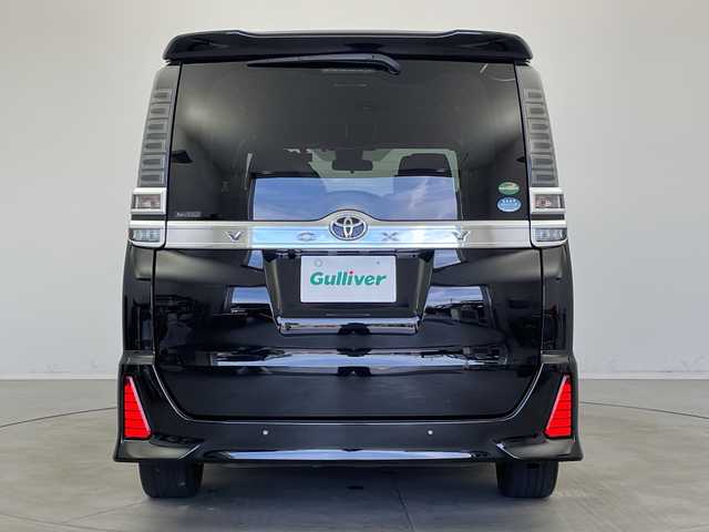 トヨタ ヴォクシー ZS 煌Ⅱ 新潟県 2019(平31)年 7万km ブラック ＡＬＰＩＮＥ製メモリナビ（Bluetooth・CD・DVD・USB）/フリップダウンモニター　/ワンオーナー　/両側パワースライドドア　/バックカメラ　/フルセグ　/衝突被害軽減システム　/前後コーナーセンサー　/ALPINE製前方ドライブレコーダー/LEDオートライト　/オートマチックハイビーム/後席オートエアコン/アイドリングストップ/MTモード付AT/ECOモード/スマートキー/純正フロアマット/純正１６インチアルミホイール