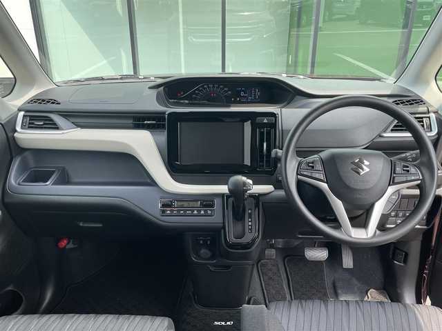 スズキ ソリオ HV MX 和歌山県 2024(令6)年 4.5万km メロウディープレッドパール デュアルカメラブレーキサポート/車線逸脱防止機能/レーダークルーズコントロール/パーキングソナー/左側パワースライドドア/運転席シートヒーター/オートライト/ヘッドライトレベライザー/リアドアサンシェード/純正15インチAW/ドアバイザー/プッシュスタート/スマートキー