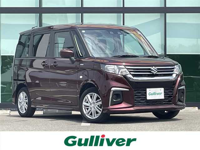 スズキ ソリオ HV MX 和歌山県 2024(令6)年 4.5万km メロウディープレッドパール デュアルカメラブレーキサポート/車線逸脱防止機能/レーダークルーズコントロール/パーキングソナー/左側パワースライドドア/運転席シートヒーター/オートライト/ヘッドライトレベライザー/リアドアサンシェード/純正15インチAW/ドアバイザー/プッシュスタート/スマートキー