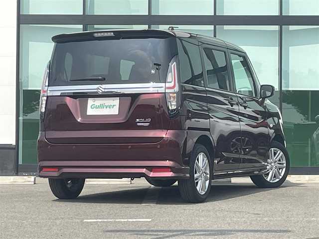 スズキ ソリオ HV MX 和歌山県 2024(令6)年 4.5万km メロウディープレッドパール デュアルカメラブレーキサポート/車線逸脱防止機能/レーダークルーズコントロール/パーキングソナー/左側パワースライドドア/運転席シートヒーター/オートライト/ヘッドライトレベライザー/リアドアサンシェード/純正15インチAW/ドアバイザー/プッシュスタート/スマートキー