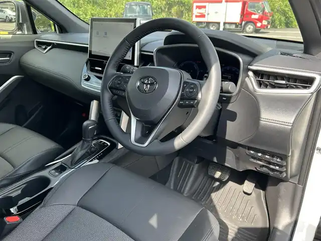 トヨタ カローラ クロス ハイブリッド Z 熊本県 2025(令7)年 0.7万km アティチュードブラックマイカ/プラチナホワイトパールマイカ パノラマルーフ/純正10.5インチディスプレイオーディオ/（Bluetooth/フルセグTV）/パノラミックビューモニター/ブラインドスポットモニター/電動リアゲート/レーダークルーズコントロール/LEDヘッドライト/ハーフレザーシート/シートヒーター/純正18インチナビ/スマートキー/ETC2.0