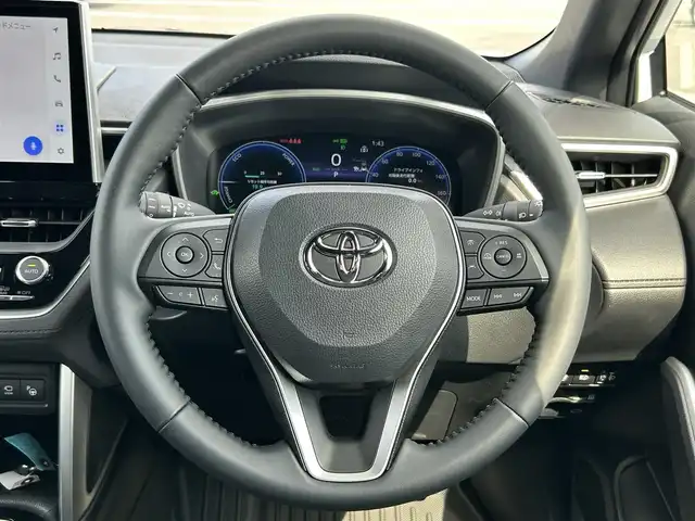 トヨタ カローラ クロス ハイブリッド Z 熊本県 2025(令7)年 0.7万km アティチュードブラックマイカ/プラチナホワイトパールマイカ パノラマルーフ/純正10.5インチディスプレイオーディオ/（Bluetooth/フルセグTV）/パノラミックビューモニター/ブラインドスポットモニター/電動リアゲート/レーダークルーズコントロール/LEDヘッドライト/ハーフレザーシート/シートヒーター/純正18インチナビ/スマートキー/ETC2.0