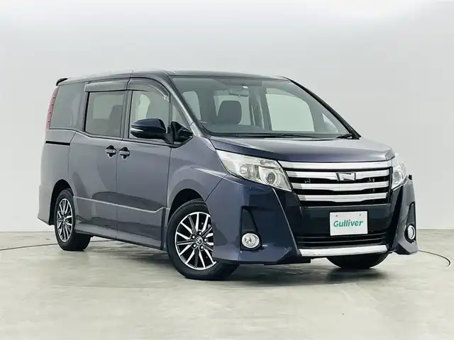 トヨタ ノア Si 福島県 2014(平26)年 5.4万km ダークバイオレットマイカメタリック トヨタセーフティセンスC/・プリクラッシュセーフティ/・レーンディパーチャーアラート/・オートマチックハイビーム/・先行車発進お知らせ機能/純正7インチナビ/・ワンセグTV/BT/SD/CD/DVD/FM/AM/・バックカメラ/・ビルトインETC/・後席フリップダウンモニター/革張りステアリング/・ステアリングスイッチ/電動格納ミラー/・ウィンカーミラー/LEDヘッドライト/・オートライト/・フォグランプ/純正フロアマット/ドアバイザー