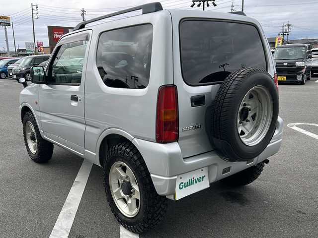 スズキ ジムニー XG 岐阜県 2001(平13)年 15.8万km シルキーシルバーメタリック 登録時走行距離157387km/ルーフレール/背面タイヤ/オーディオ/リモコンキー/布系シート/フルフラットシート/純正フロアマット/エアコン/ハロゲンヘッドライト/エアバッグ運転席・助手席/パワーウィンドウ／パワーステアリング