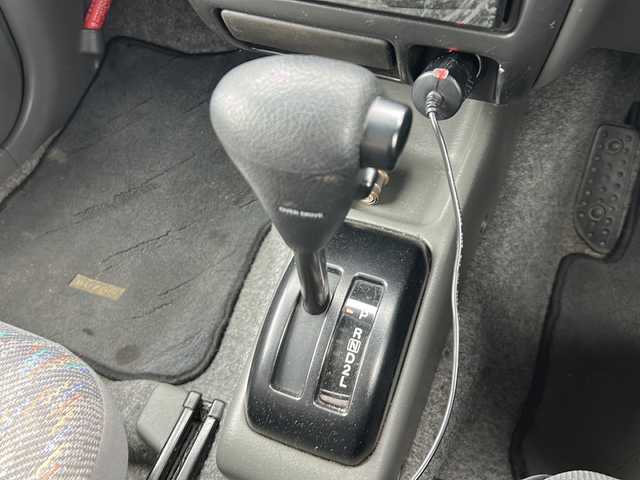 スズキ ジムニー XG 岐阜県 2001(平13)年 15.8万km シルキーシルバーメタリック 登録時走行距離157387km/ルーフレール/背面タイヤ/オーディオ/リモコンキー/布系シート/フルフラットシート/純正フロアマット/エアコン/ハロゲンヘッドライト/エアバッグ運転席・助手席/パワーウィンドウ／パワーステアリング