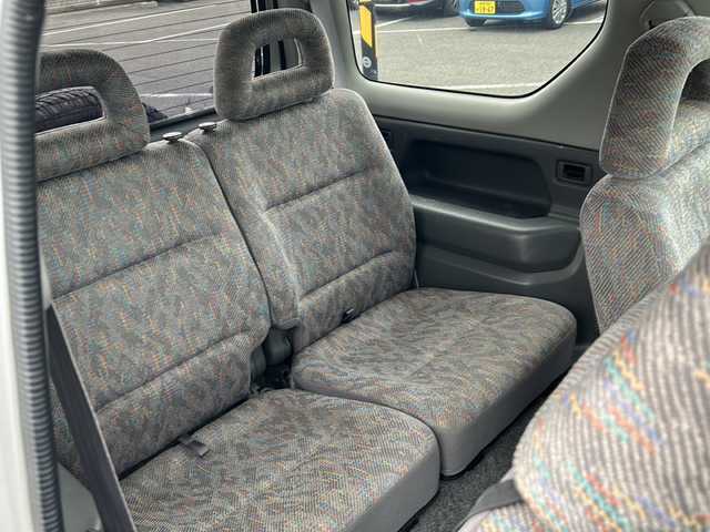 スズキ ジムニー XG 岐阜県 2001(平13)年 15.8万km シルキーシルバーメタリック 登録時走行距離157387km/ルーフレール/背面タイヤ/オーディオ/リモコンキー/布系シート/フルフラットシート/純正フロアマット/エアコン/ハロゲンヘッドライト/エアバッグ運転席・助手席/パワーウィンドウ／パワーステアリング