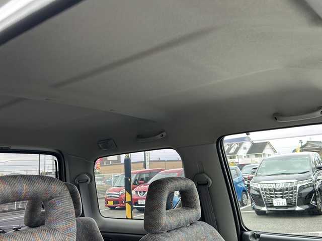 スズキ ジムニー XG 岐阜県 2001(平13)年 15.8万km シルキーシルバーメタリック 登録時走行距離157387km/ルーフレール/背面タイヤ/オーディオ/リモコンキー/布系シート/フルフラットシート/純正フロアマット/エアコン/ハロゲンヘッドライト/エアバッグ運転席・助手席/パワーウィンドウ／パワーステアリング