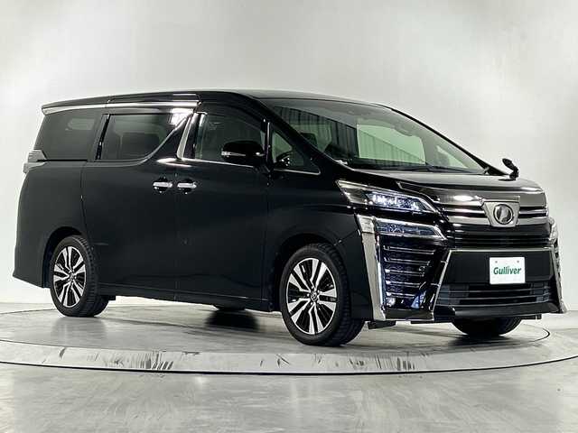 トヨタ ヴェルファイア Z Gエディション 佐賀県 2018(平30)年 5.4万km ブラック 純正10インチナビ【NSZN-Z66T】/フルセグTV/CD/DVD/Bluetooth/純正12インチフリップダウンモニター/バックカメラ/衝突被害軽減システム/レーダークルーズコントロール/レーンアシスト/パーキングサポートブレーキ/標識認識機能/先行車発進告知機能/横滑り防止装置/オートライト/オートマチックハイビーム/LEDヘッドライト/LEDフォグライト/電子パーキングブレーキ/ブレーキホールド/デジタルインナールームミラー/社外前方ドライブレコーダー/ビルトインETC/ステアリングヒーター/両側パワースライドドア/レザーシート/運転席・助手席パワーシート/運転席・助手席シートヒーター/運転席・助手席エアシート/運転席メモリーシート/ISOFIX対応/オットマンシート/ウォークスルー/純正18インチアルミホイール/プッシュスタート/スマートキー