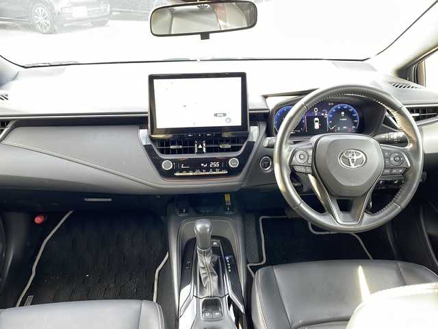 トヨタ カローラツーリング ハイブリッド ダブルバイビー 新潟県 2023(令5)年 6.5万km プラチナホワイトパールマイカ 純正ナビ（BT/DTV/FM/AM/フルセグ）/前席シートヒーター/ステアリングヒーター/オートライト/ハーフレザーシート/ETC2.0/ステアリングスイッチ/パーキングアシスト/フォグランプ/電動格納ウィンカーミラー/ドアバイザー