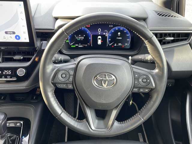 トヨタ カローラツーリング ハイブリッド ダブルバイビー 新潟県 2023(令5)年 6.5万km プラチナホワイトパールマイカ 純正ナビ（BT/DTV/FM/AM/フルセグ）/前席シートヒーター/ステアリングヒーター/オートライト/ハーフレザーシート/ETC2.0/ステアリングスイッチ/パーキングアシスト/フォグランプ/電動格納ウィンカーミラー/ドアバイザー