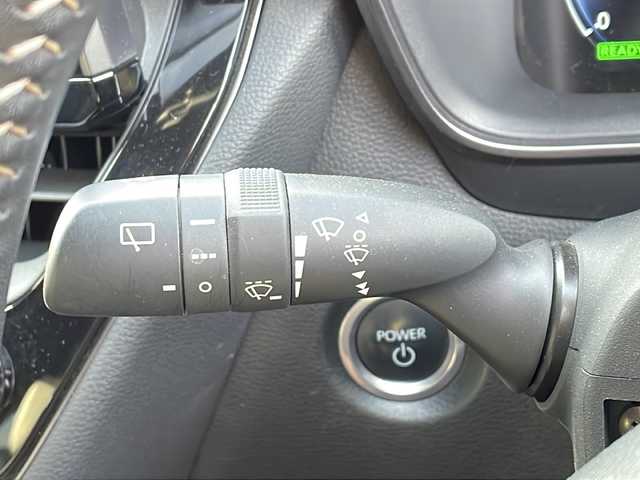 トヨタ カローラツーリング ハイブリッド ダブルバイビー 新潟県 2023(令5)年 6.5万km プラチナホワイトパールマイカ 純正ナビ（BT/DTV/FM/AM/フルセグ）/前席シートヒーター/ステアリングヒーター/オートライト/ハーフレザーシート/ETC2.0/ステアリングスイッチ/パーキングアシスト/フォグランプ/電動格納ウィンカーミラー/ドアバイザー