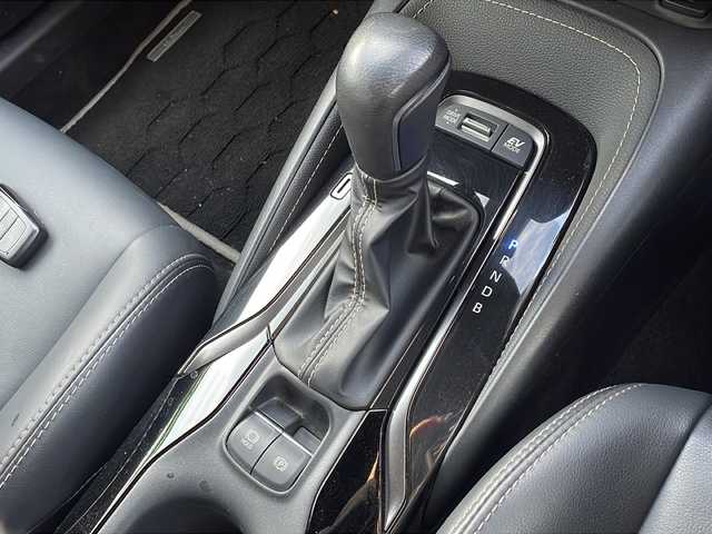 トヨタ カローラツーリング ハイブリッド ダブルバイビー 新潟県 2023(令5)年 6.5万km プラチナホワイトパールマイカ 純正ナビ（BT/DTV/FM/AM/フルセグ）/前席シートヒーター/ステアリングヒーター/オートライト/ハーフレザーシート/ETC2.0/ステアリングスイッチ/パーキングアシスト/フォグランプ/電動格納ウィンカーミラー/ドアバイザー