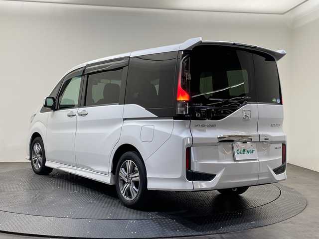 ホンダ ステップワゴン スパーダ eHEV G EXホンダS 愛媛県 2021(令3)年 6.4万km プラチナホワイトパール Hondaインターナビ＋リンクアップフリー/＋ETC2.0車載器（ナビゲーション連動）/純正10インチ/Bluetooth フルセグTV DVD再生可/バックカメラ//ホンダセンシング/アダプティブクルーズコントロール/レーンアシスト/ナビ装着用スペシャルパッケージ/＋ETC2.0車載器/わくわくゲート/運転席&助手席シートヒーター/アクティブコーナーライト/ハーフレザーシート/LEDオートライト/ステアリングリモコン/ハーフレザーシート