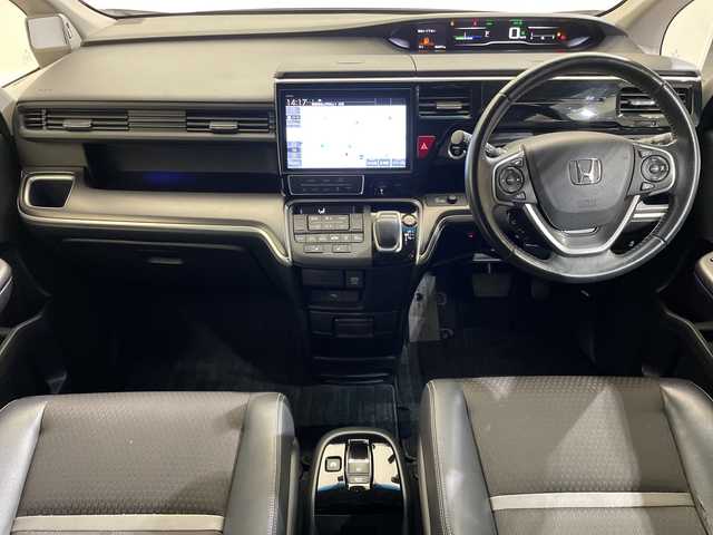 ホンダ ステップワゴン スパーダ eHEV G EXホンダS 愛媛県 2021(令3)年 6.4万km プラチナホワイトパール Hondaインターナビ＋リンクアップフリー/＋ETC2.0車載器（ナビゲーション連動）/純正10インチ/Bluetooth フルセグTV DVD再生可/バックカメラ//ホンダセンシング/アダプティブクルーズコントロール/レーンアシスト/ナビ装着用スペシャルパッケージ/＋ETC2.0車載器/わくわくゲート/運転席&助手席シートヒーター/アクティブコーナーライト/ハーフレザーシート/LEDオートライト/ステアリングリモコン/ハーフレザーシート
