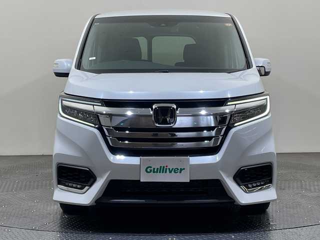 ホンダ ステップワゴン スパーダ eHEV G EXホンダS 愛媛県 2021(令3)年 6.4万km プラチナホワイトパール Hondaインターナビ＋リンクアップフリー/＋ETC2.0車載器（ナビゲーション連動）/純正10インチ/Bluetooth フルセグTV DVD再生可/バックカメラ//ホンダセンシング/アダプティブクルーズコントロール/レーンアシスト/ナビ装着用スペシャルパッケージ/＋ETC2.0車載器/わくわくゲート/運転席&助手席シートヒーター/アクティブコーナーライト/ハーフレザーシート/LEDオートライト/ステアリングリモコン/ハーフレザーシート