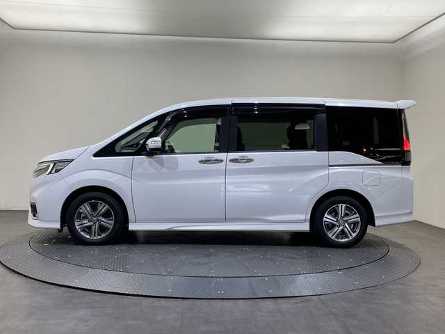 ホンダ ステップワゴン スパーダ eHEV G EXホンダS 愛媛県 2021(令3)年 6.4万km プラチナホワイトパール Hondaインターナビ＋リンクアップフリー/＋ETC2.0車載器（ナビゲーション連動）/純正10インチ/Bluetooth フルセグTV DVD再生可/バックカメラ//ホンダセンシング/アダプティブクルーズコントロール/レーンアシスト/ナビ装着用スペシャルパッケージ/＋ETC2.0車載器/わくわくゲート/運転席&助手席シートヒーター/アクティブコーナーライト/ハーフレザーシート/LEDオートライト/ステアリングリモコン/ハーフレザーシート