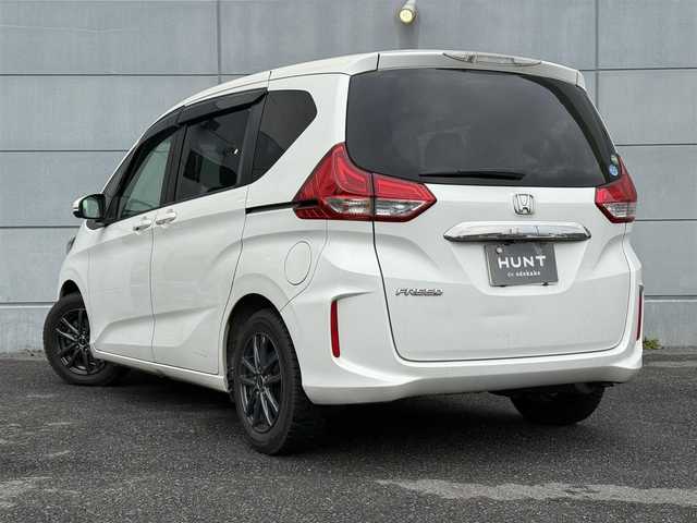 ホンダ フリード G ホンダセンシング 千葉県 2017(平29)年 13.7万km ホワイトオーキッドパール 純正ナビ　/ＣＤ/ＤＶＤ/ＳＤ/Ｂｌｕｅｔｏｏｔｈ/フルセグTV/バックカメラ　/ＥＴＣ　/両側パワースライドドア　/純正AW付サマータイヤ積み込みあり　/ステアリングスイッチ　/LEDヘッドライト/オートライト