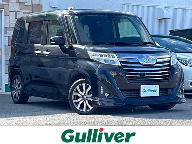 トヨタ ルーミー カスタムG－T 徳島県 2017(平29)年 5.5万km ブラックマイカメタリック Panasonicナビ：CN-RA03WD/(AM/FM/DISC/SD/Bluetooth)/スマートアシスト/・衝突回避支援ブレーキ機能/・衝突警報機能/・車線逸脱警報機能/・先行車発進お知らせ機能/・コーナーセンサー/・オートハイビーム/バックカメラ/両側パワースライドドア/シートヒーター/ドライブレコーダー/ETC/純正15インチアルミホイール/プッシュスタート/スマートキー