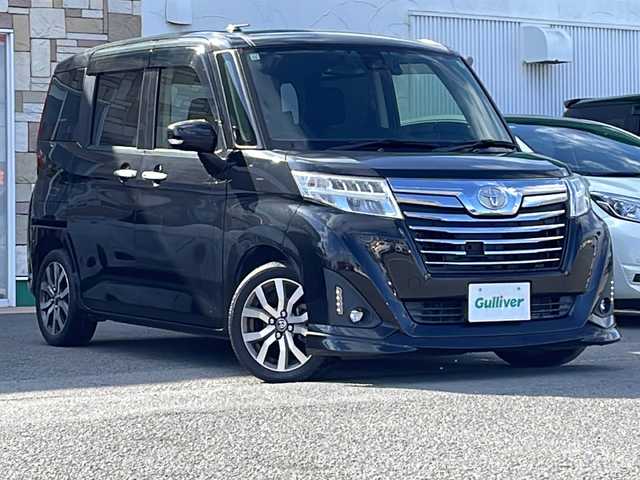 トヨタ ルーミー カスタムG－T 徳島県 2017(平29)年 5.5万km ブラックマイカメタリック Panasonicナビ：CN-RA03WD/(AM/FM/DISC/SD/Bluetooth)/スマートアシスト/・衝突回避支援ブレーキ機能/・衝突警報機能/・車線逸脱警報機能/・先行車発進お知らせ機能/・コーナーセンサー/・オートハイビーム/バックカメラ/両側パワースライドドア/シートヒーター/ドライブレコーダー/ETC/純正15インチアルミホイール/プッシュスタート/スマートキー