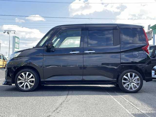 トヨタ ルーミー カスタムG－T 徳島県 2017(平29)年 5.5万km ブラックマイカメタリック Panasonicナビ：CN-RA03WD/(AM/FM/DISC/SD/Bluetooth)/スマートアシスト/・衝突回避支援ブレーキ機能/・衝突警報機能/・車線逸脱警報機能/・先行車発進お知らせ機能/・コーナーセンサー/・オートハイビーム/バックカメラ/両側パワースライドドア/シートヒーター/ドライブレコーダー/ETC/純正15インチアルミホイール/プッシュスタート/スマートキー