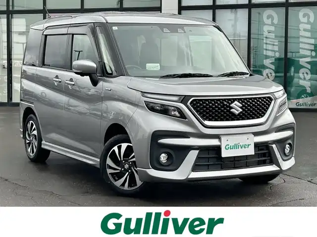 スズキ ソリオ バンディット HV MV 道南・函館 2021(令3)年 1.2万km プレミアムシルバーメタリック /純正ナビ//フルセグＴＶ//ドライブレコーダー//全周囲カメラ//両側パワースライドドア//シートヒーター//クルーズコントロール//ヘッドアップディスプレイ//衝突軽減ブレーキ//コーナーセンサー//オートライト//オートハイビーム//フロアマット//スマートキー//プッシュスタート