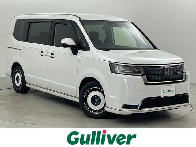 ホンダ ステップワゴン スパーダ eHEV 福岡県 2023(令5)年 3万km プラチナホワイトパール ワンオーナー　/純正１１．４型ナビ/フルセグTV　/バックカメラ　/ホンダセンシング　/レーダークルーズコントロール　/コーナーセンサー　/衝突被害軽減ブレーキ　/レーンキープ　/アクセル踏み間違い防止　/ブラインドスポットモニター/パドルシフト　/両側電動スライドドア　/ハーフレザーシート　/シートヒーター　/パワーバックドア　/ＬＥＤヘッドライト　/純正１６インチアルミホイール　/純正ＡＷ付き冬タイヤ４本積込み