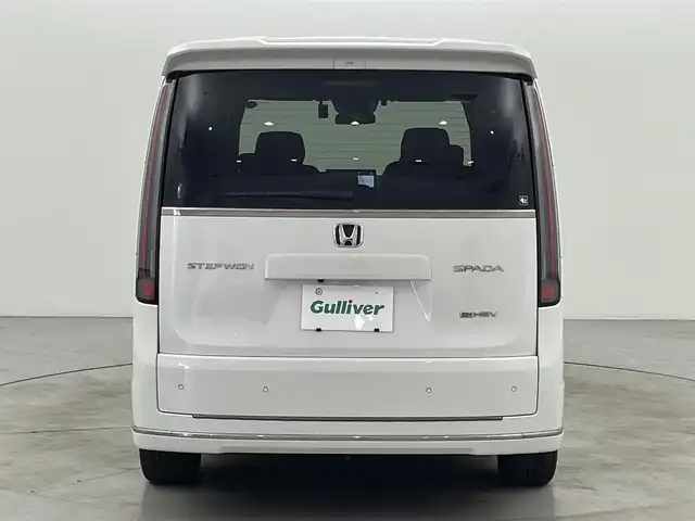 ホンダ ステップワゴン スパーダ eHEV 福岡県 2023(令5)年 3万km プラチナホワイトパール ワンオーナー　/純正１１．４型ナビ/フルセグTV　/バックカメラ　/ホンダセンシング　/レーダークルーズコントロール　/コーナーセンサー　/衝突被害軽減ブレーキ　/レーンキープ　/アクセル踏み間違い防止　/ブラインドスポットモニター/パドルシフト　/両側電動スライドドア　/ハーフレザーシート　/シートヒーター　/パワーバックドア　/ＬＥＤヘッドライト　/純正１６インチアルミホイール　/純正ＡＷ付き冬タイヤ４本積込み
