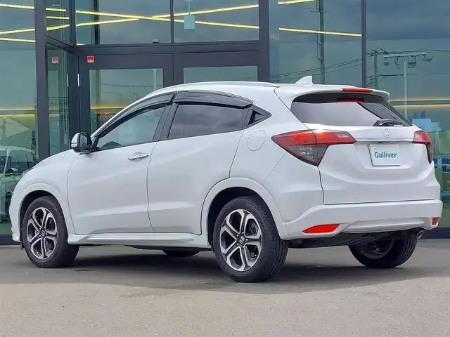 ホンダ ヴェゼル ハイブリッド Z ホンダセンシング 東京都 2018(平30)年 4.9万km プラチナホワイトパール Honda SENSING/・衝突軽減ブレーキ/・車線維持支援システム/・アダプティブクルーズコントロール/パドルシフト/純正８インチメモリーナビ（VXM-187VFEi）/フルセグTV/バックカメラ/ETC/ドライブレコーダー (DRX-GFR01)/ハーフレザーシート/シートヒーター/純正フロアマット/LEDヘッドライト/オートライト/電動コーナーポール/17インチ純正アルミホイール