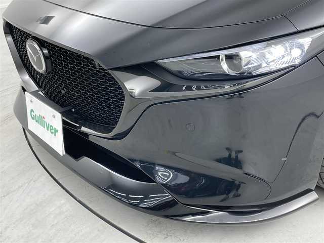 マツダ マツダ３ファストバック 15S ツーリング 埼玉県 2023(令5)年 3.3万km ジェットブラックマイカ 純正ナビ　フルセグ　ＢＴ　ＤＶＤ　ＨＤＭＩ　SIGNATURE STYLEエアロ　ブリッツ車高調　　純正サス有　バックカメラ　レーダークルーズコントロール　ＢＳＭ　ヘッドアップディスプレイ　テレビキャンセラー　前後センサー シートカバー
