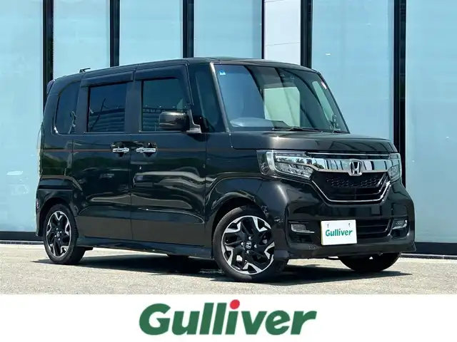 ホンダ Ｎ ＢＯＸ カスタム G L ターボ ホンダセンシング 大阪府 2020(令2)年 3.9万km プレミアムグラマラスブロンズP 純正ナビ/   フルセグTV/CD/DVD/Bluetooth/USB/バックモニター/ターボ車/衝突軽減ブレーキ/横滑り防止装置/コーナーセンサー/前席シートヒーター/両側パワースライドドア/レーダークルーズコントロール/レーンキープアシスト/パドルシフト/アイドリングストップ/前後ドライブレコーダー/純正15インチアルミホイール/純正フロアマット/プッシュスタート/スマートキー/ＥＴＣ/ＬＥＤ/禁煙車