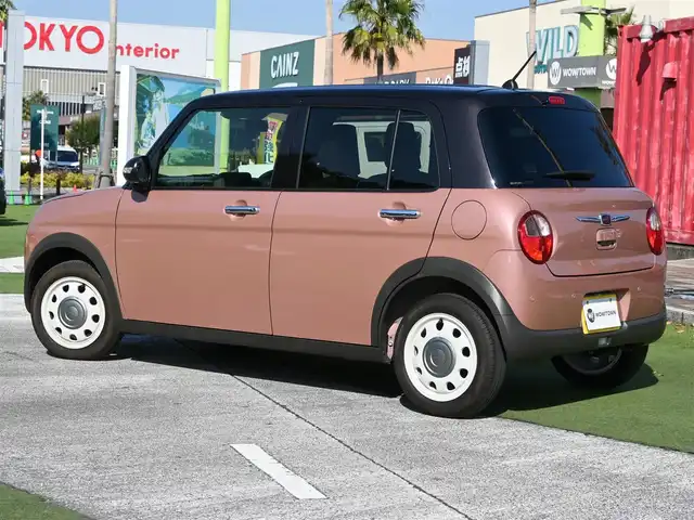 スズキ ラパン ＬＣ X 千葉県 2024(令6)年 0.5万km テラコッタピンクメタリック/アーバンブラウン 2トーン デュアルカメラブレーキサポート/アイドリングストップ/ディスプレイオーディオ/【Bluetooth接続】/バックカメラ/ハーフレザーシート/前席シートヒーター/革巻きステアリング/ステアリングスイッチ/LEDヘッドライト/ウインカーミラー/リアコーナーセンサー/携帯リモコン